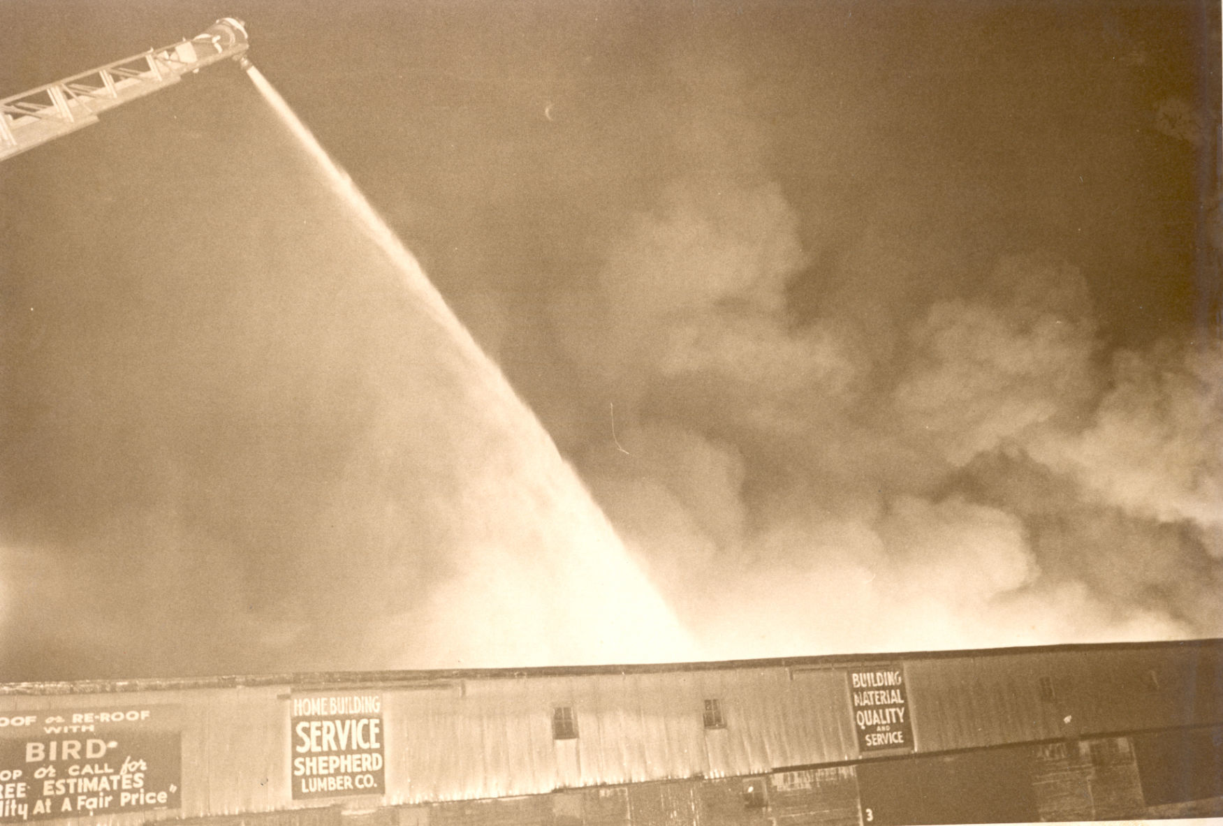 Firefighters at lumberyard fire: Waterloo riot of Sept. 13, 1968
